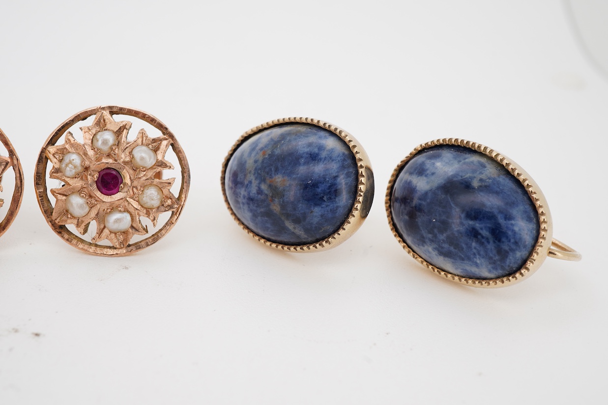 Three assorted modern pairs of ear clips including oval 750 yellow metal and carnelian, 19mm, unmarked yellow metal synthetic ruby and seed pearl and unmarked yellow metal and amethyst, together with a pair of 9ct and so